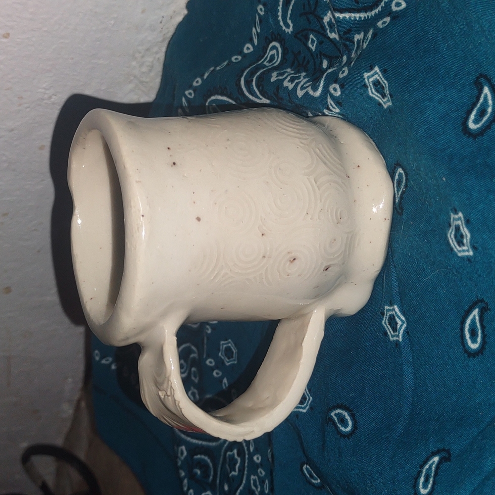 Hand-sculpted ceramic mug